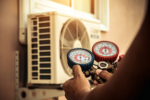 Professional Air Conditioning Service technician working in Long Beach, CA